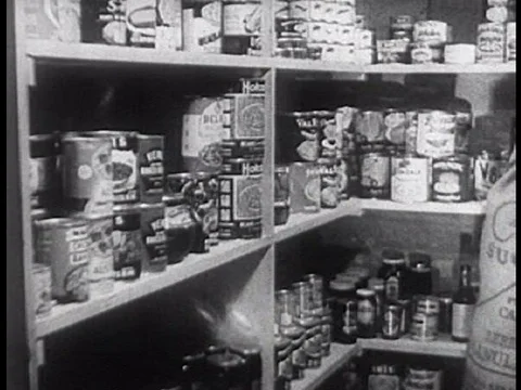 Wartime conservation includes saving kitchen fat, steel, rubber and shellac, in Video stock 79462499