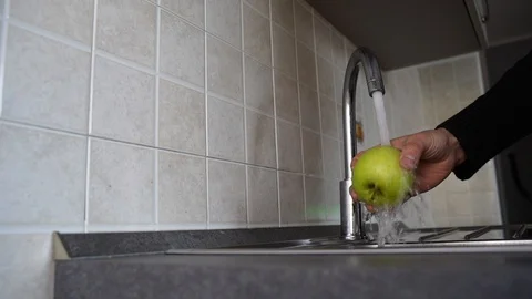 Wash the apple Stock Footage 122701898