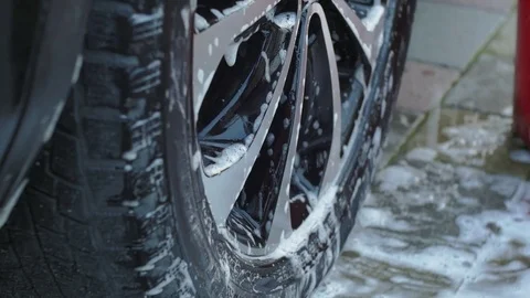 Wash the car wheels Stock Footage 72699933