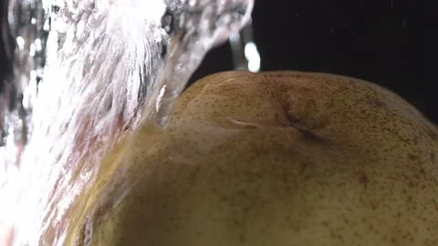Wash with care then take a bite, juicy and crisp a sweet delight Stock Footage 292235130
