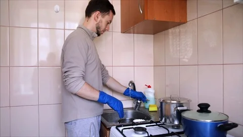 Wash dishes Stock Footage 129826673