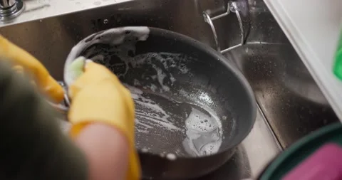 Wash dishes in the kitchen Stock Footage 132701254