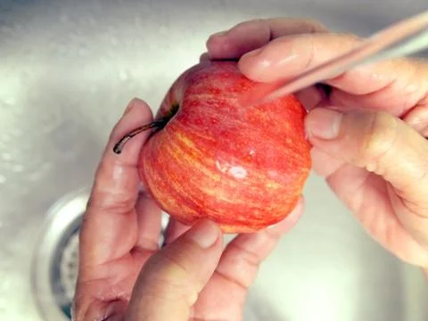 Wash the fruit Stock Photos