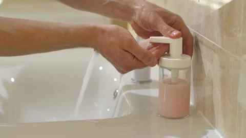 Wash hands with liquid soap Stock Footage 149060884