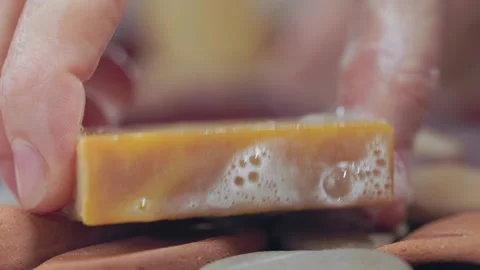 Wash hands with yellow soap Stock Footage 249832071