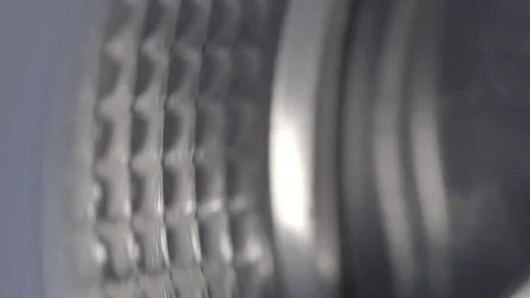 Wash machine drum in slow motion Stock Footage 73598750