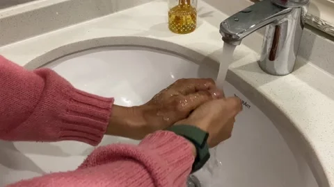 Wash our hands frequently Stock Footage