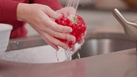 Wash a Red Bell Pepper Close Up and Turn Off Water Faucet Video stock 155113865