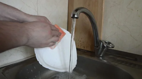 Wash soiled dishes 動画素材 48930620