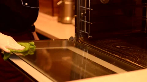 Wash the stove Vídeos de archivo 59579045