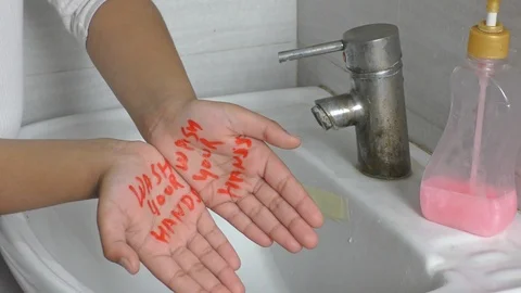Wash your hands message on and showing how to wash them. Stock Footage 126270877