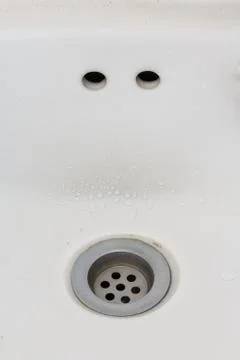 Washbasin human face Stock Photos