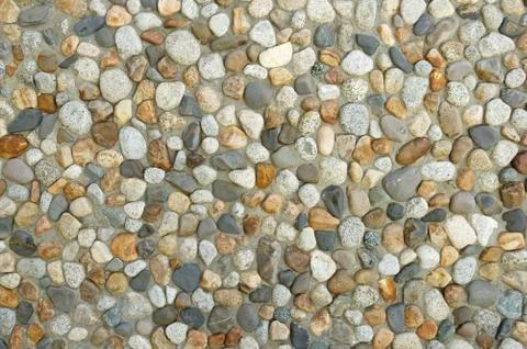 Washed Cobble Wall Background Foto stock