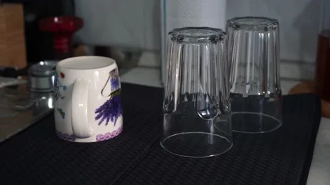 Washed dishes to dry while lying on the kitchen table Stock Footage 163819204