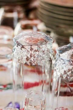 Washed glasses turned upside down and other various dishes Stock Photos