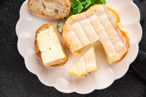Washed rind cheese soft cheese with orange rind munster french cheese tasty.. Stock Photos