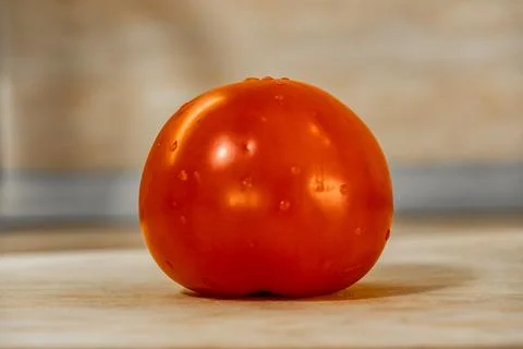 Washed ripe tomato on the table Stock-Fotos