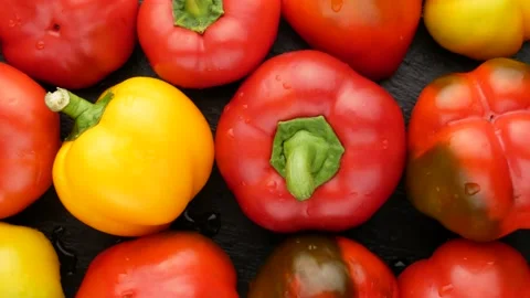 Washed sweet pepper. Red and yellow peppers, top view. Stock-Footage 138160916