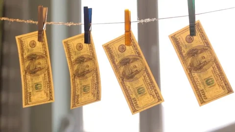 Washed US dollars drying on rope. Stock Footage 72990289