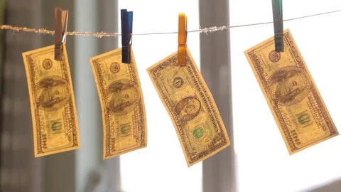 Washed US dollars drying on rope. Stock Footage 72990297