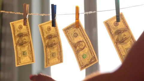 Washed US dollars drying on rope. Stock Footage 72990300