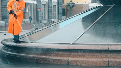 The washerman will clean the station square Stock Footage 103802136