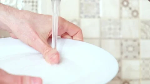 Washes the dishes close-up Stock Footage 137310258
