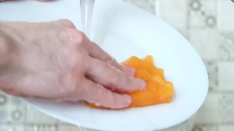 Washes the dishes close-up Stock Footage 137310271