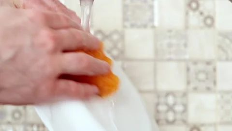 Washes the dishes close-up Stock Footage 137310289
