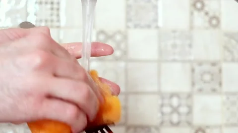 Washes the dishes close-up Stock Footage 137310294