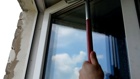 Washes a window in the office building on a working day Stock Footage 110209505