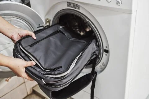 Washing and cleaning backpack Stock Photos