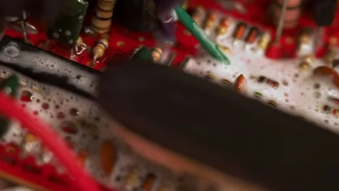 Washing and cleaning microcircuit witn soap and foam Stock Footage 138287882