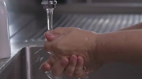 Washing and drying hands Stock Footage 64056104
