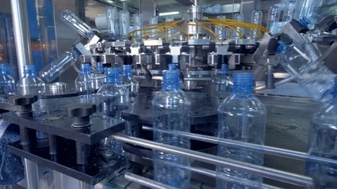 A washing and rinsing machine assembly for new PET bottles. 4K. Stock Footage 79501902