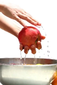 Washing apple Stock Photos