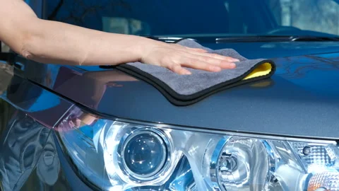 Washing auto with yellow microfiber cloth outdoor. Stock Footage 284380942