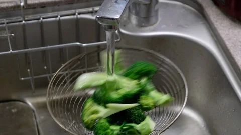 Washing Broccoli Stock Footage 102367226