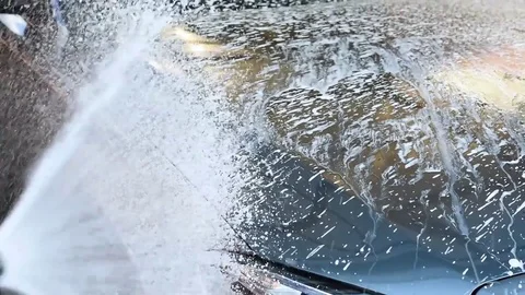 Washing the car with foam Stock Footage 79603482