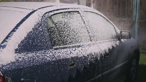 Washing the car with foam Stock Footage 201196177