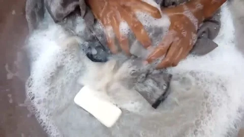 Washing the Clothes 動画素材 142932318