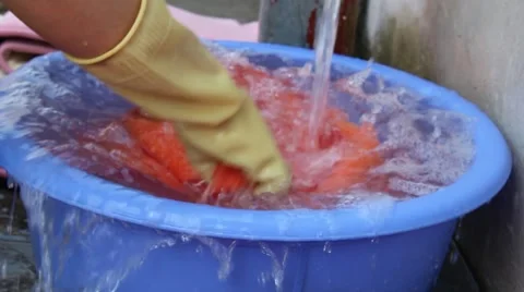 Washing clothes by hand Stock Footage 56081340
