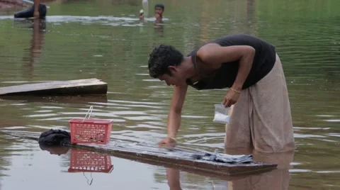 Washing Clothes in the River Stock Footage 40073377