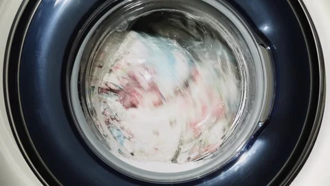 Washing clothes in the washing machine Stock Footage 89700607