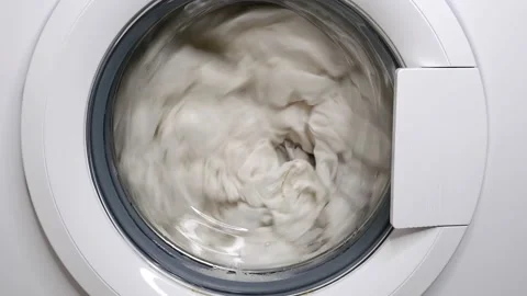 Washing clothes in a washing machine Stock Footage 156041520