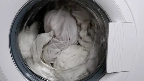 Washing clothes in a washing machine. Stock Footage 158016747