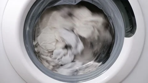 Washing clothes in a washing machine. Stock Footage 167605943