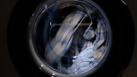 Washing colored clothes in washing machine. Stock Footage 267582918