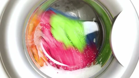 Washing colored laundry in the washing machine 스톡 동영상 229724967