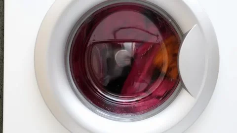 Washing colored laundry in the washing machine Stock-Footage 272202626